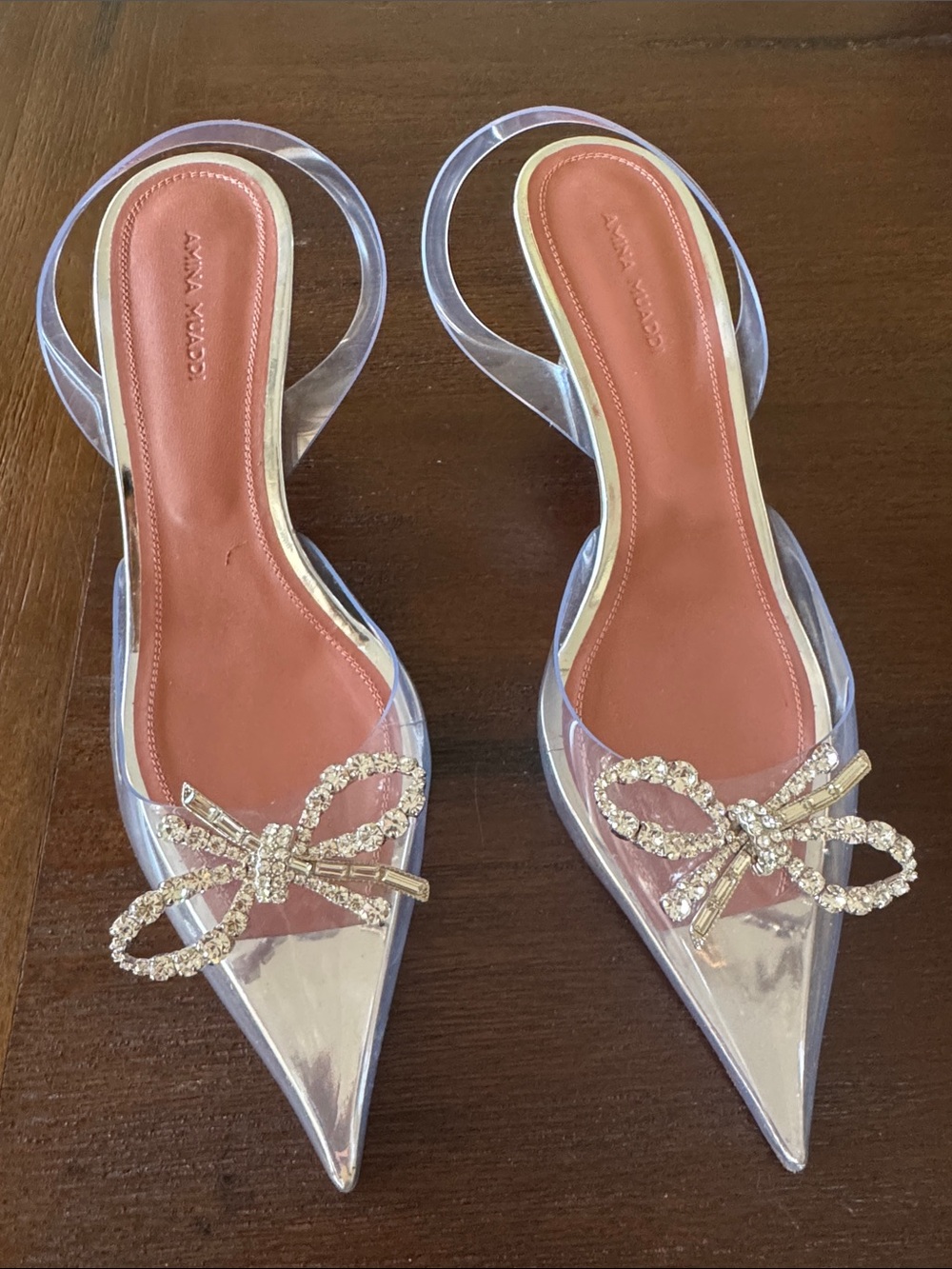 Amina Muaddi Clear Pointed Slingback Mules with Crystal Bow - Pink Insole